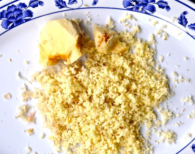 Grated galangal ready for making salad. Save tough woody centers for making soups.
